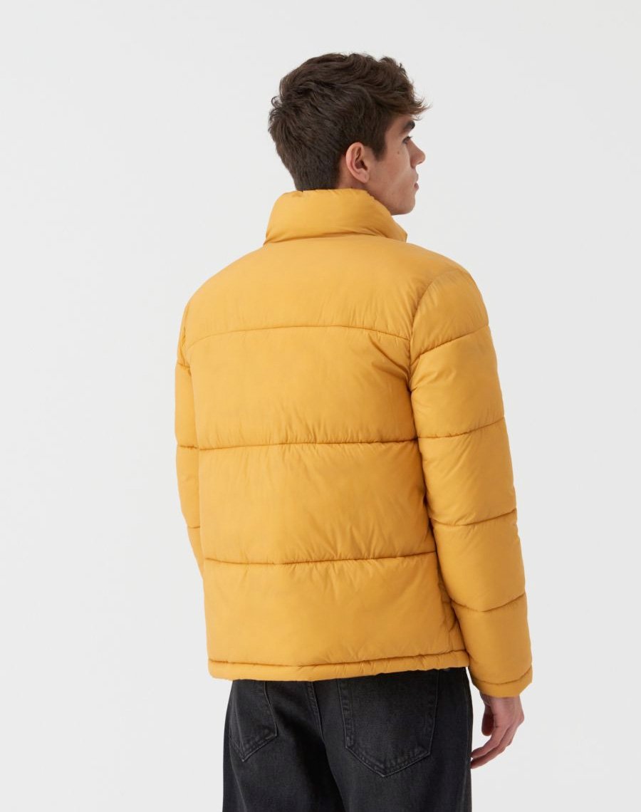 Quilted jacket with high stand up collar